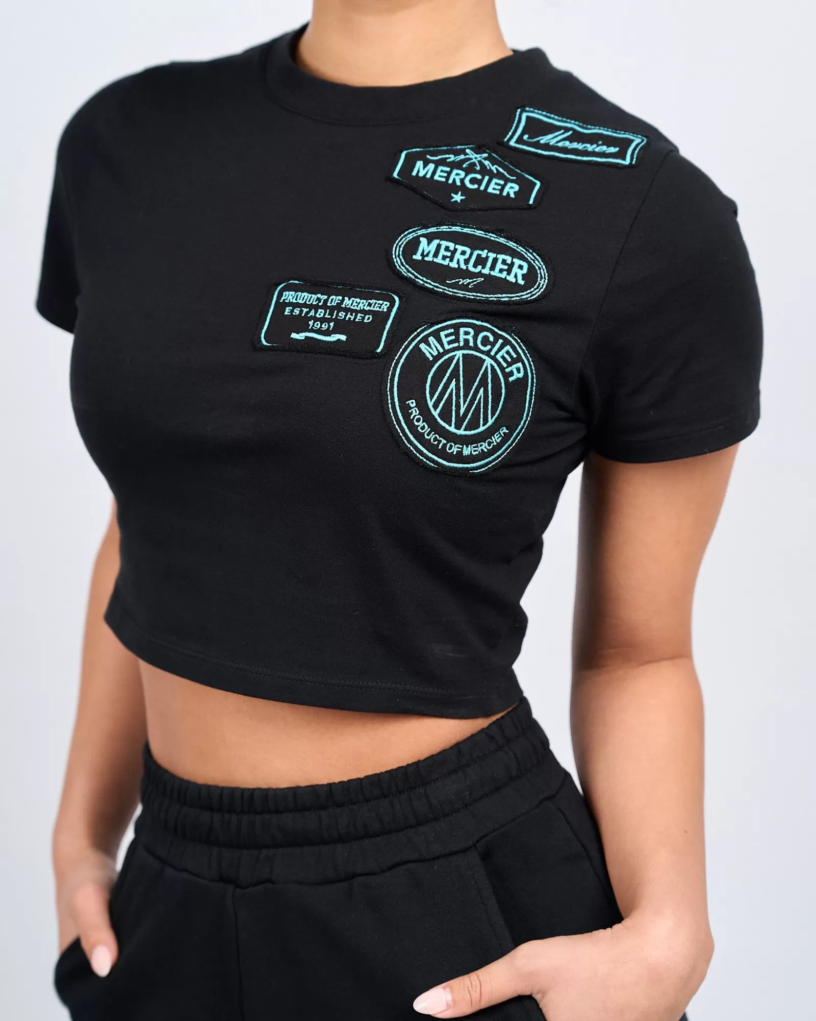 Damen-tops>Mercier Damen Schwarz Tiffany Abzeichen Raw Edge Baby T-Shirt