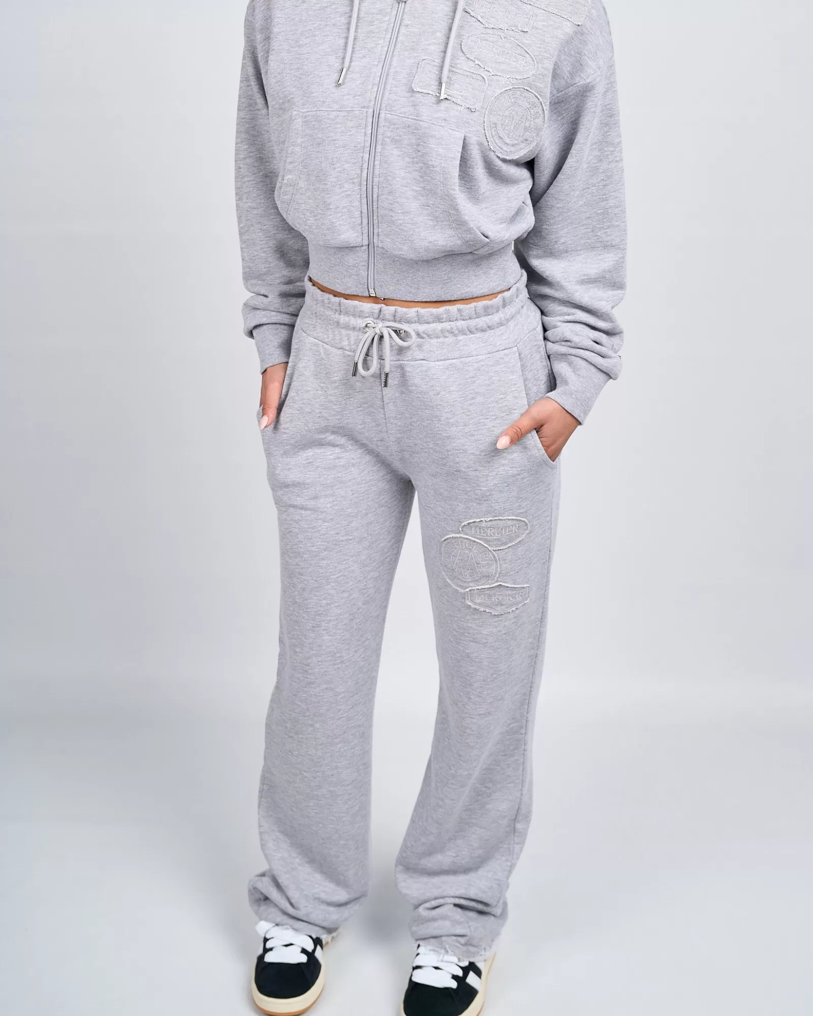 Frauen Jogger/leggings | Trainingsanzüge Für Damen>Mercier Grau melierte Jogginghose „OG Badge Raw“ für Damen