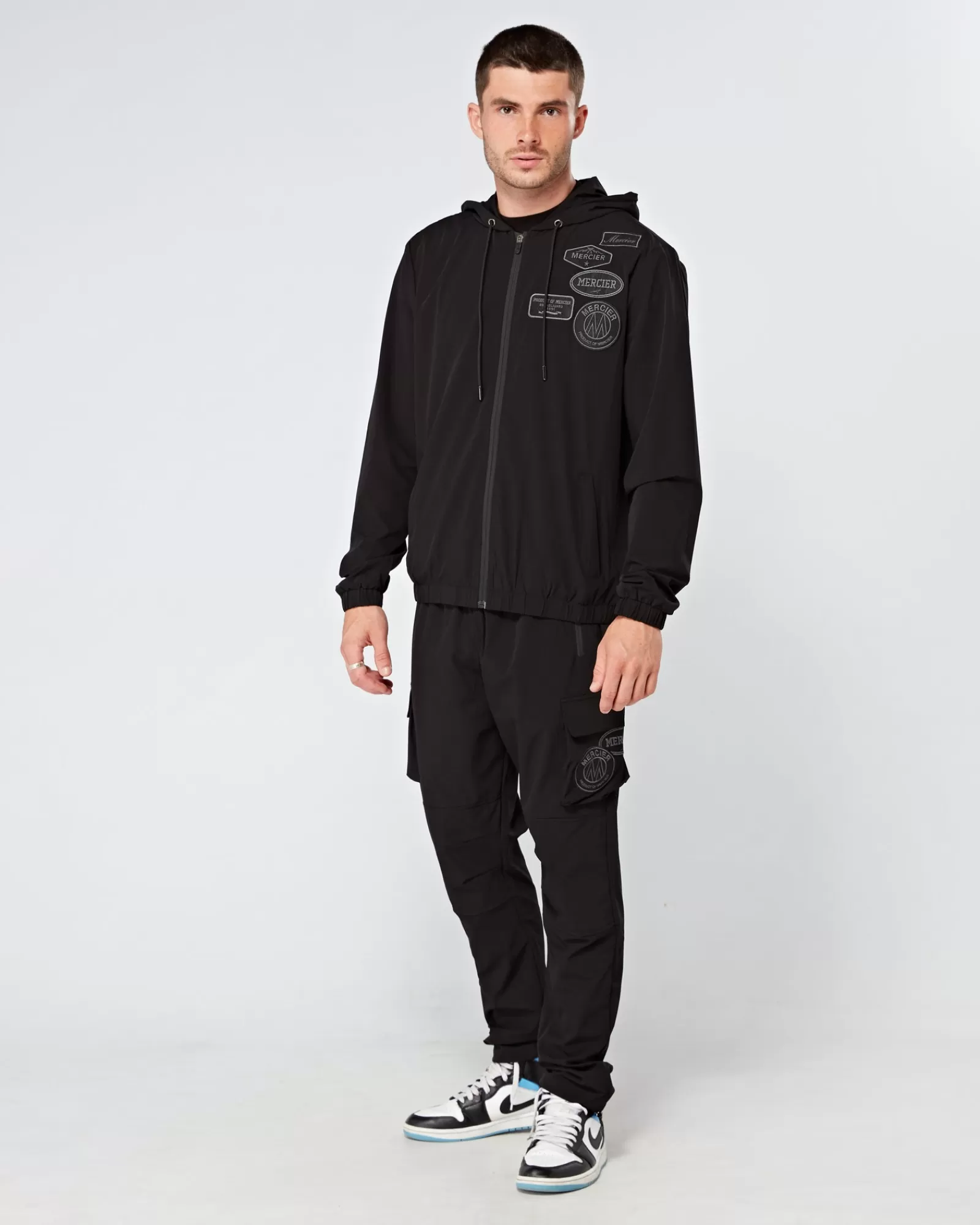 Windjacken & Cargohosen>Mercier Schwarze Cargohose mit Ton-in-Ton-Badge